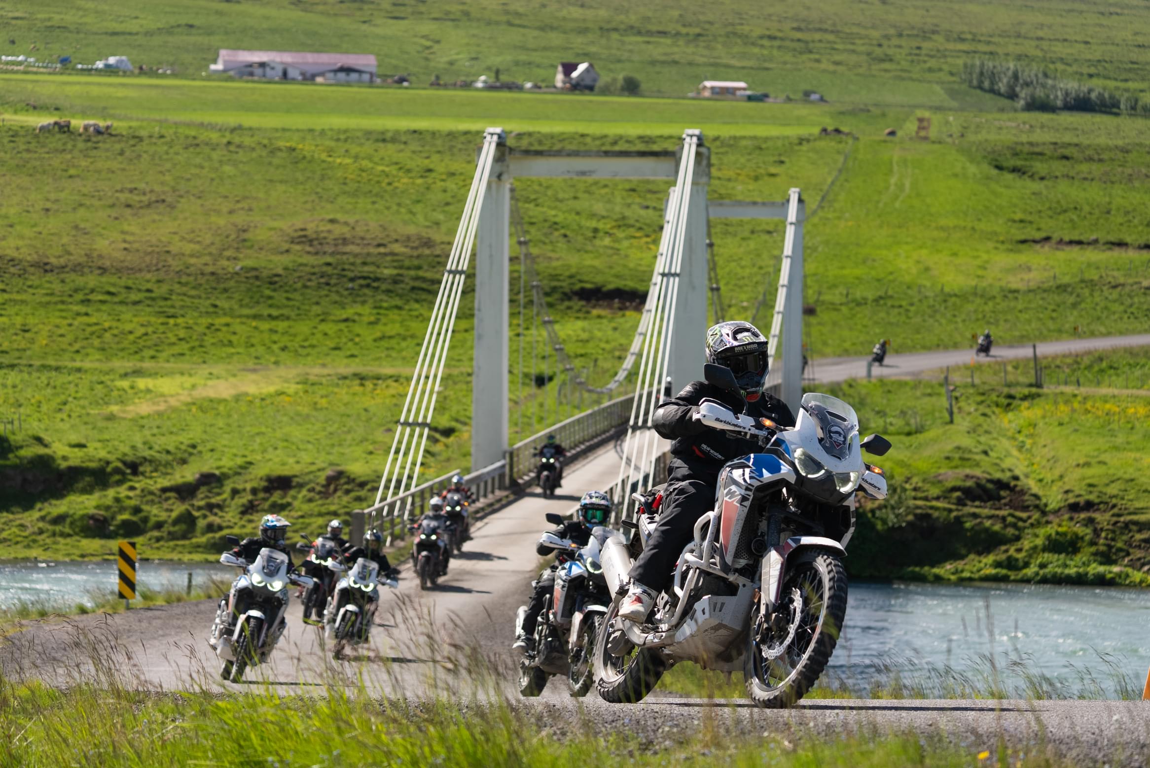 Cardo Units shown on a group of motorbikes riding in the country side