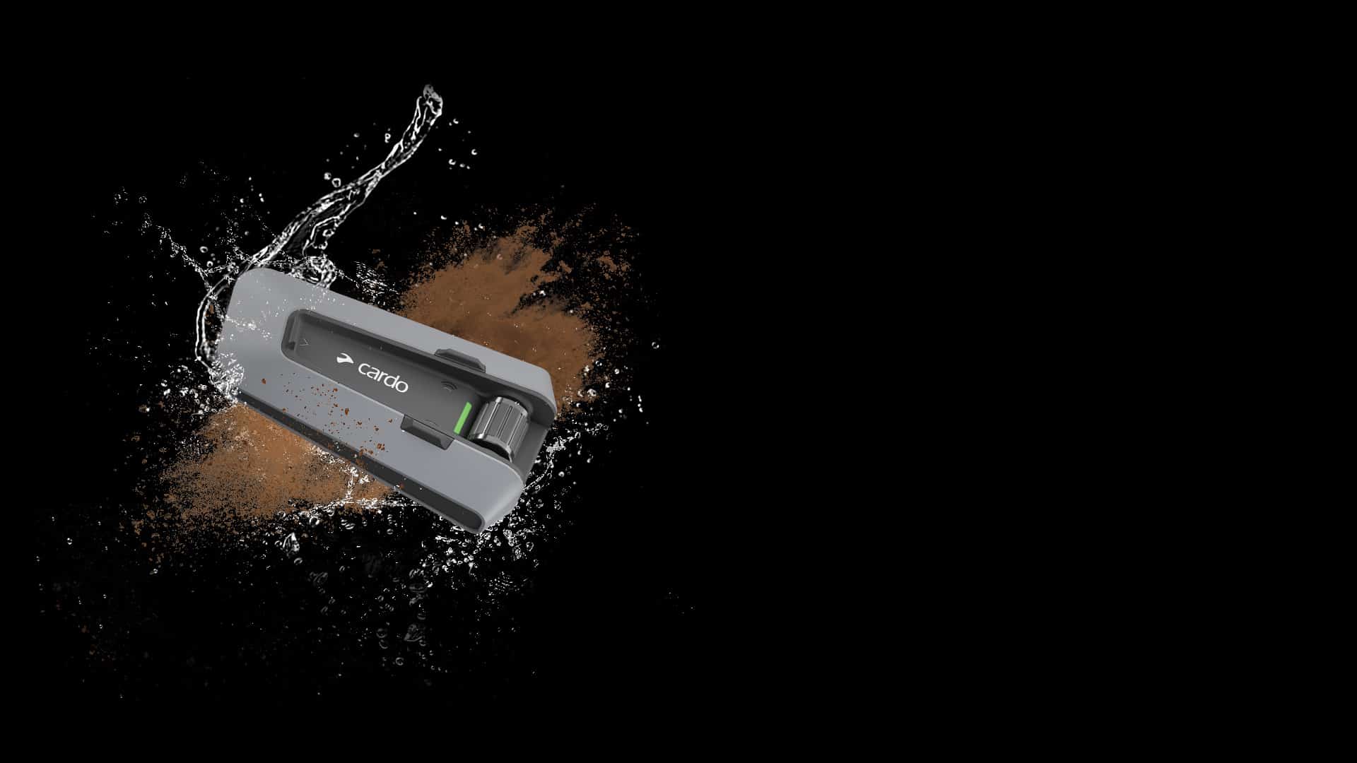 Cardo Systems NZ | Packtalk Edge offroad shown with water and mud IP67